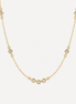 Collier Ana OPALINE PARIS en or avec pendentif délicat, porté sur un fond neutre, mettant en valeur le design élégant.