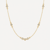 Collier Ana OPALINE PARIS en or avec pendentif délicat, porté sur un fond neutre, mettant en valeur le design élégant.