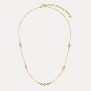 Collier Ana OPALINE PARIS en or avec pendentif délicat, porté sur un fond neutre, mettant en valeur le design élégant.