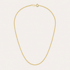Collier Noa de OPALINE PARIS avec pendentif délicat en or et perles, porté sur un fond neutre.