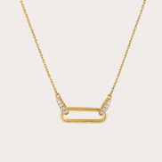 Collier Melia OPALINE PARIS en or avec pendentif délicat, porté sur fond blanc.