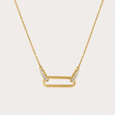 Collier Melia OPALINE PARIS en or avec pendentif délicat, porté sur fond blanc.