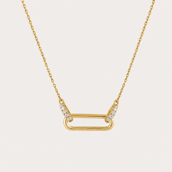 Collier Melia OPALINE PARIS en or avec pendentif délicat, porté sur fond blanc.